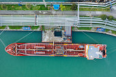Ship tanker with LPG. Process of loading of tanker, drone aerial view