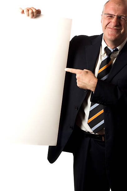istock Doubtful businessman shows blank sign 173587133