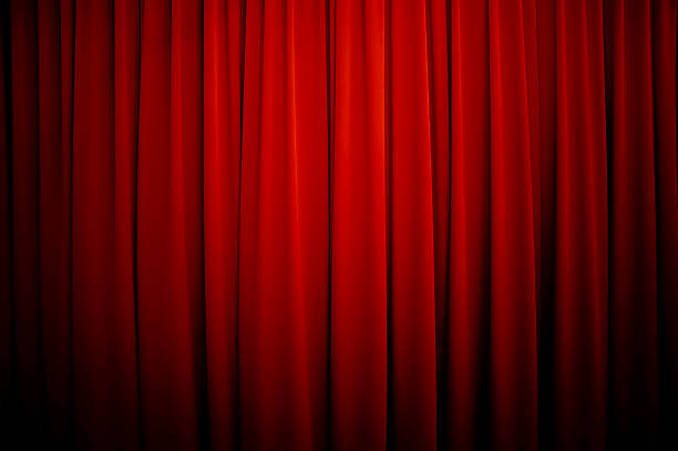 Theatre Curtains Background Royalty free stock photo of a theatre curtain background with vignette. curtain stock pictures, royalty-free photos & images