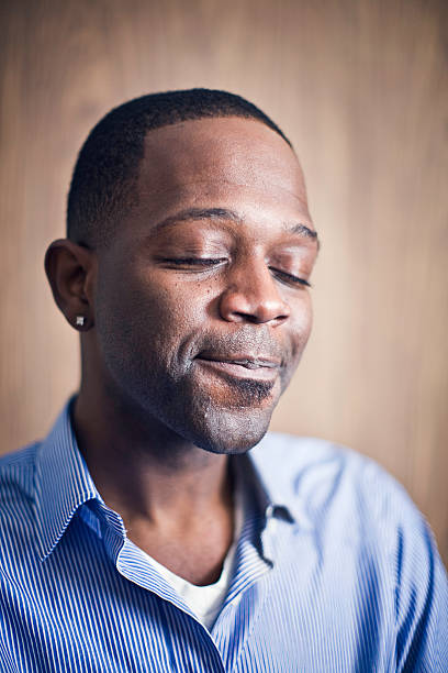 istock Praying / Thinking Young African American Man 173589371