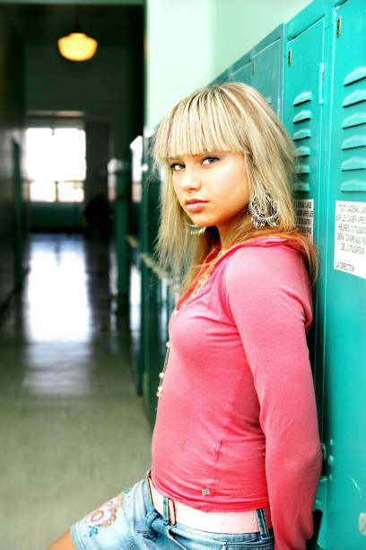 istock Young woman in a school hall 173589408
