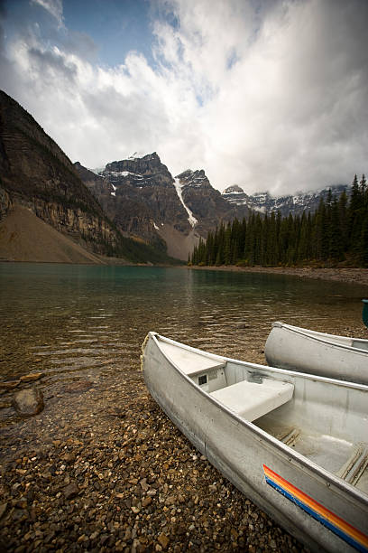 istock Canoes by a lake 173589801
