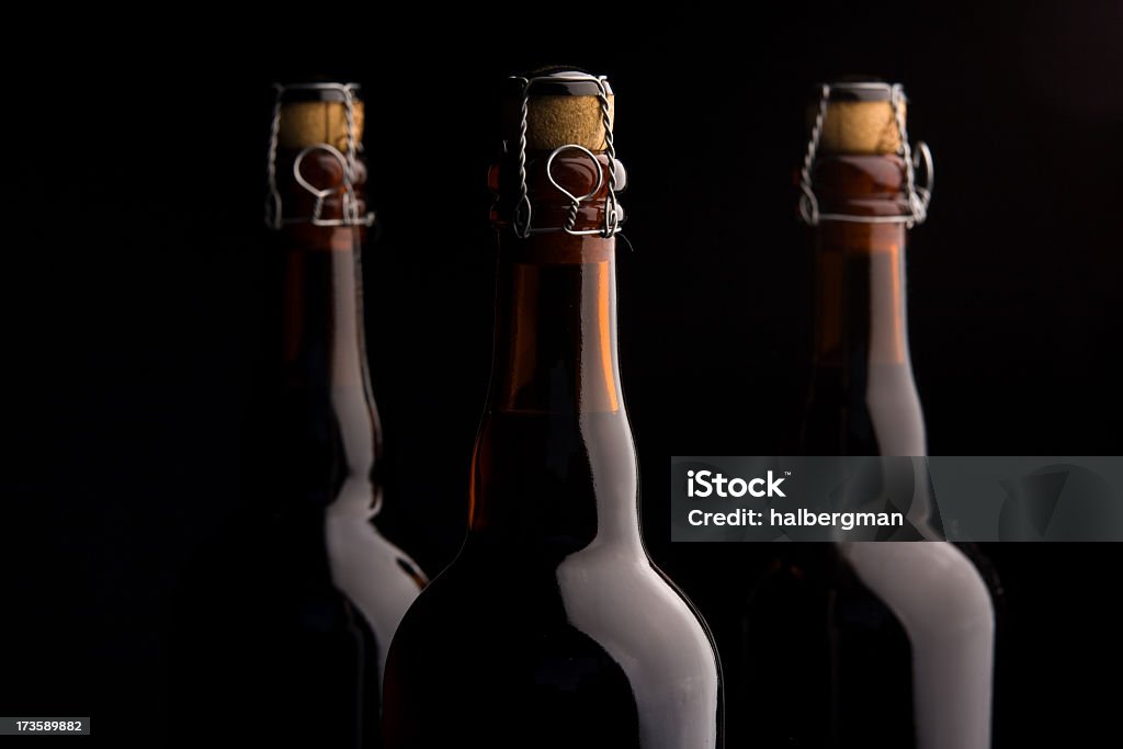 Tres botellas de cerveza corked - Foto de stock de Botella libre de derechos