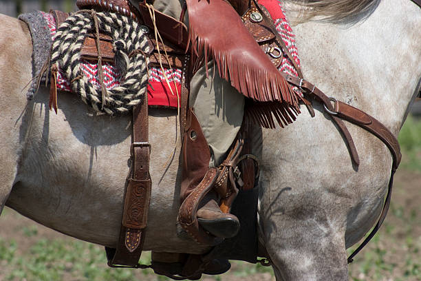 istock Cowboy and Saddle Horseback Detail 173590187