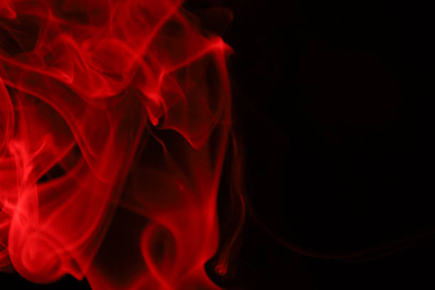 istock Red smoke on a dark background, colourful abstract 1735904052