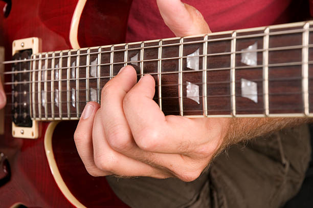 гитара игрок - low key audio стоковые фото и изображения