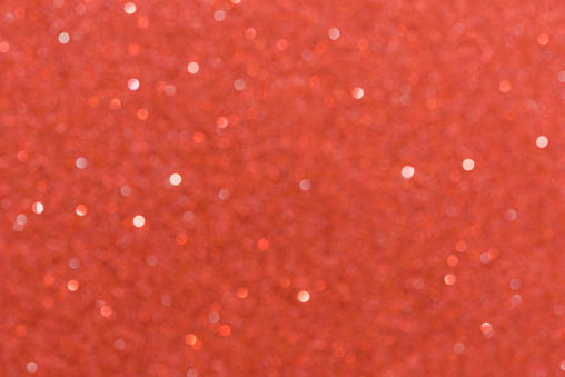 Beautiful glitter red bokeh abstract background.