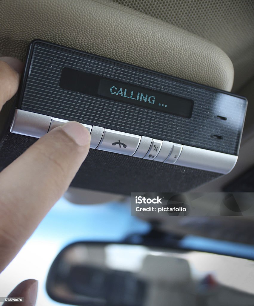 hands free car kit using hands free car kit..Car Related Images.. Bluetooth Stock Photo