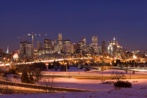 Beautiful Denver skyline on a snowy evening at dusk.SEE SIMILAR: