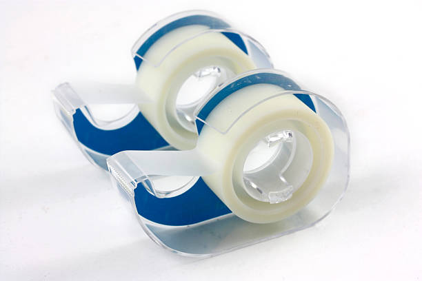 istock two disposable tape dispensers isolated on white background 173591100
