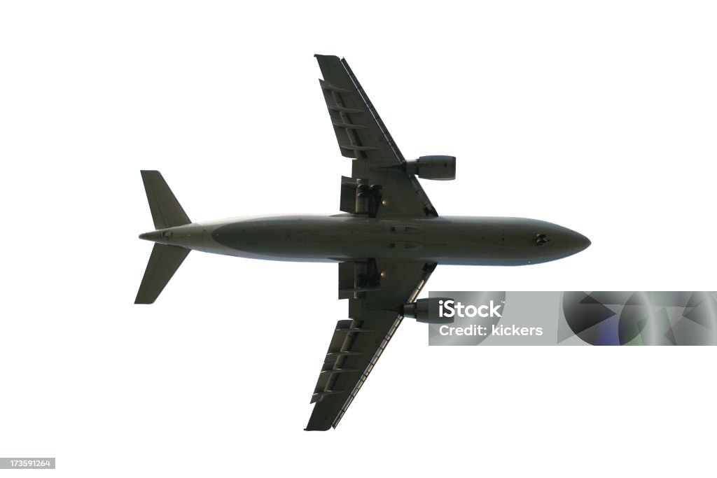 Airplane from below, isolated "A aircraft passing by from the left,  isolated." Aerospace Industry Stock Photo