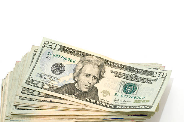 istock Pile of twenty dollar bills 173592680