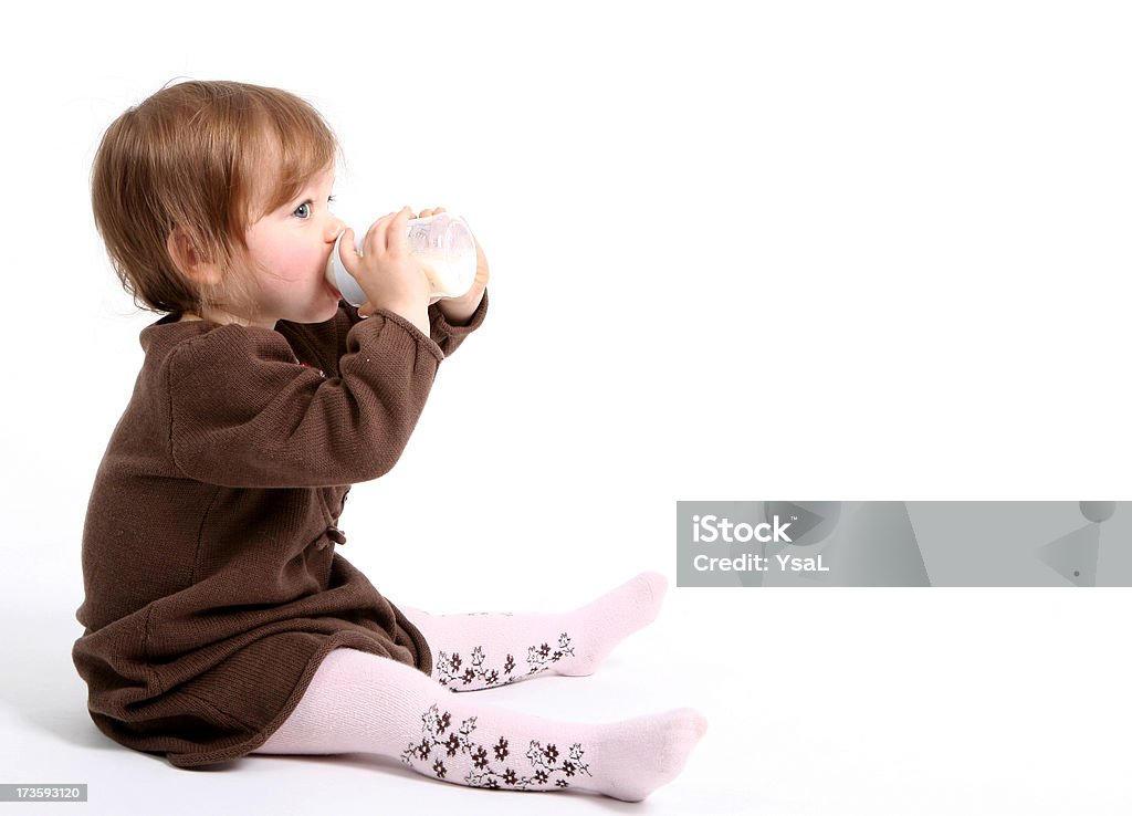 Baby with bottle Baby with bottle.Others photographs of this baby in this lightbox:http://i27.servimg.com/u/f27/09/04/17/08/untitl10.jpg Baby - Human Age Stock Photo