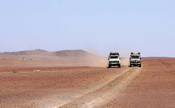 istock Landrovers in the Desert 173593159