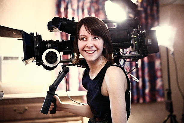 istock Happy Woman with Camera 173593740