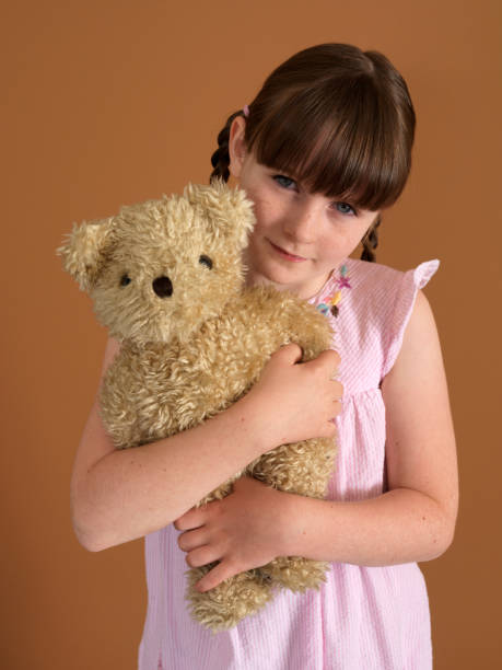 istock Girl and Teddy 173593778