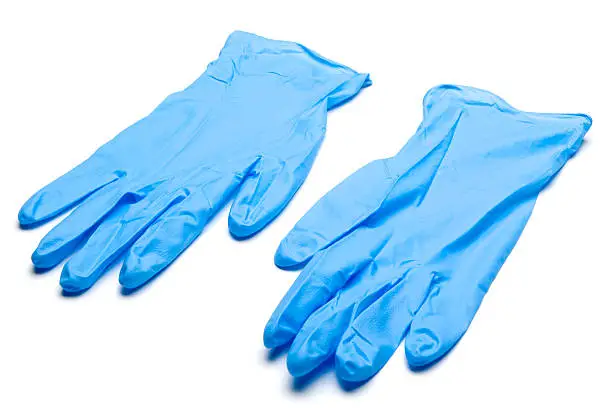 "Pair of blue, wrinkled surgical gloves on white background. No selection made. Series of different views."