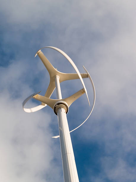 istock Vertical axis wind turbine rotating with motion blur 173594744
