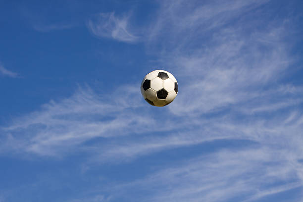 Soccer ball in the air stock photo