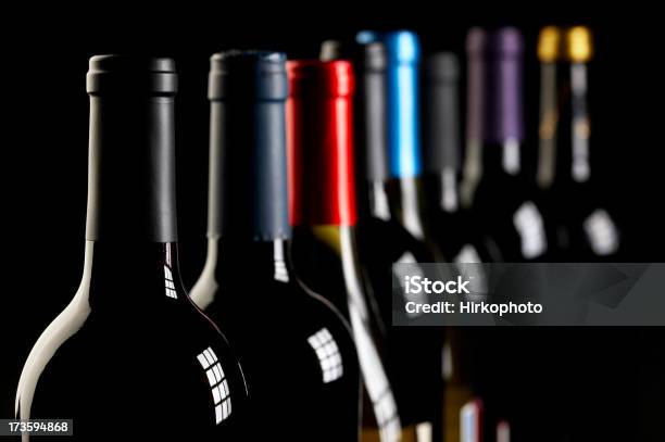 Wine Bottles In A Row On Black Stock Photo - Download Image Now - Abstract, Wine, Wine Bottle
