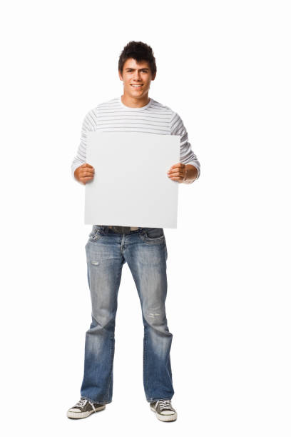 istock Happy young boy holding white blank board 173594894