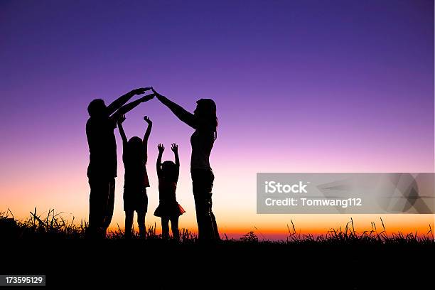 Happy Family Making The Home Sign Stock Photo - Download Image Now - Family, In Silhouette, Shadow