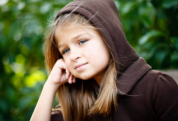 istock girl with a hoddie 173595315