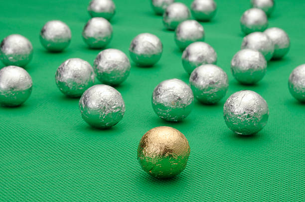 istock Gold and Silver Wrapped Chocolate Balls 173595378