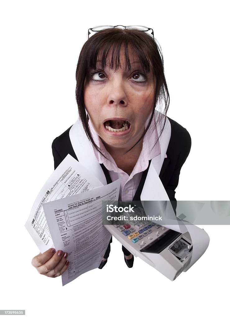 Tax Nightmare A fisheye image of a stressed woman holding tax forms and a calculator. 1040 Tax Form Stock Photo