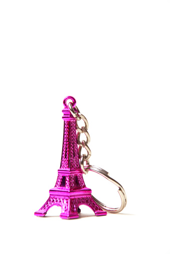 Macro shot of an Eiffel tower keyring in pink