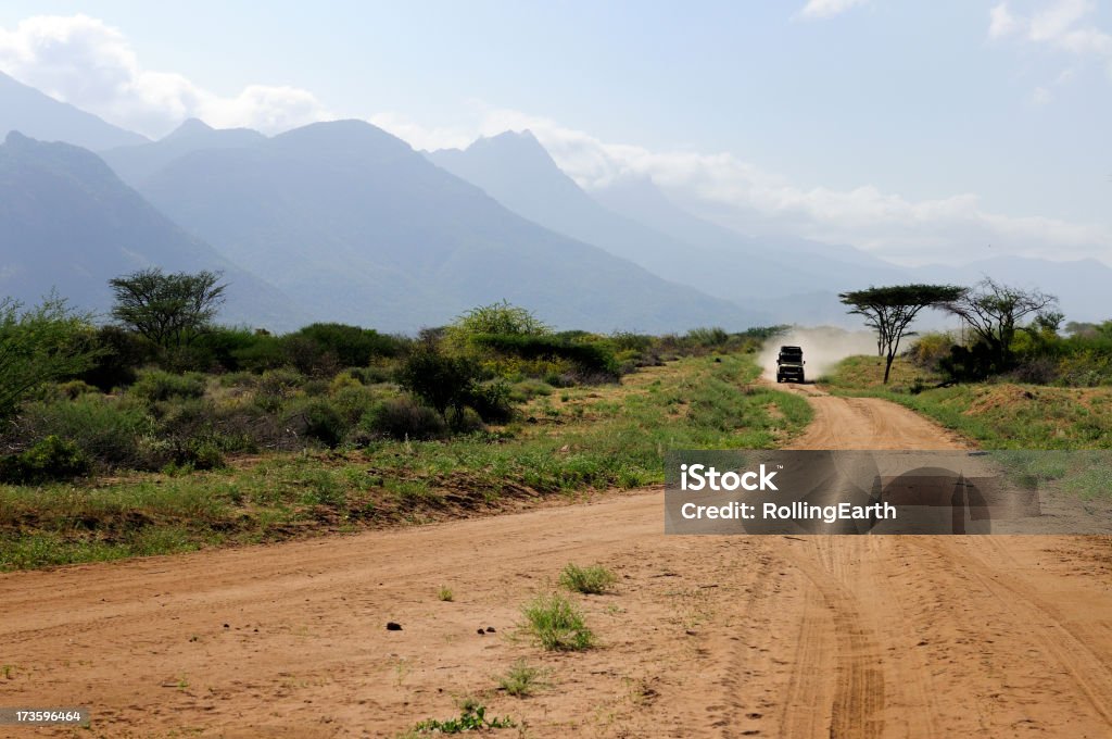 Landrover Adventuring アフリカ - サファリのロイヤリティフリーストックフォト