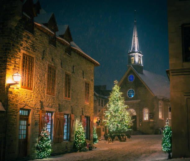 istock Christmas tree and Church, snowy night, Petit-Champlain, Old Quebec City, Canada 1735976112