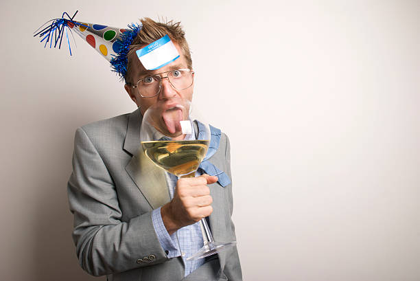istock Drunk Businessman Office Worker Licks Big Wine Glass 173597797
