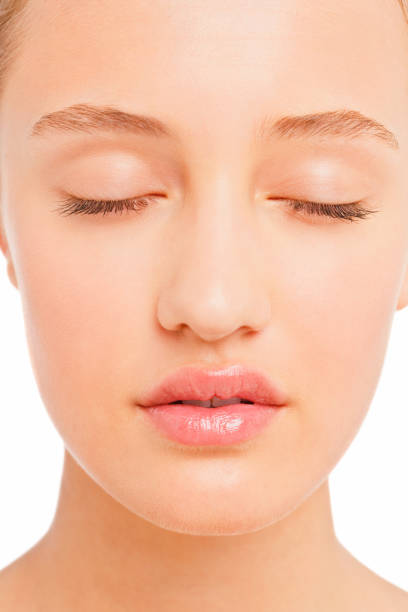 istock Beautiful young woman with eyes closed 173597835