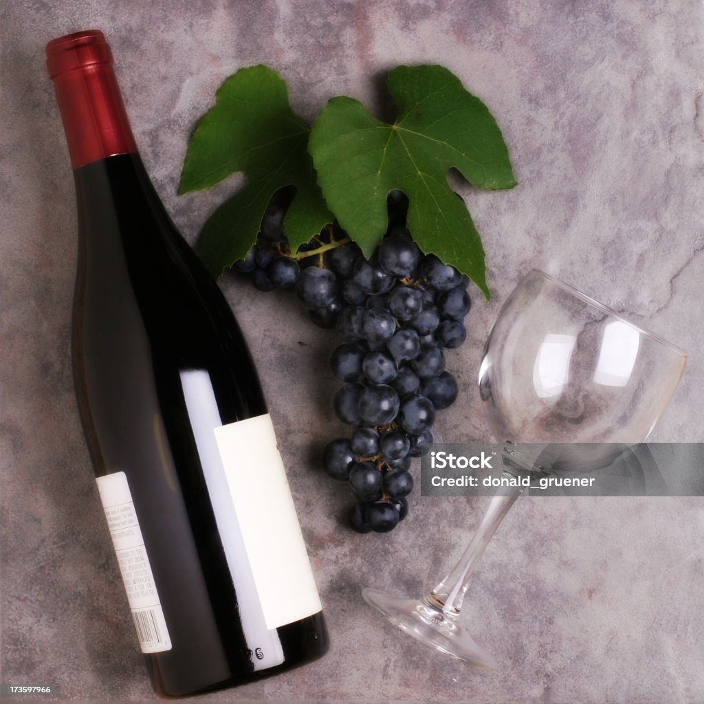 Wine Composition Bottle, glass, & bunch of wine grapes fresh off the vine Oregon - US State Stock Photo