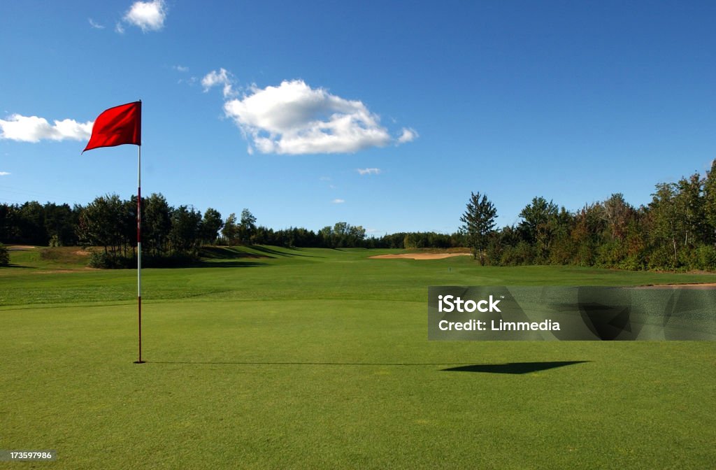 golf field3 green with flag in the hole. Golf Course Stock Photo