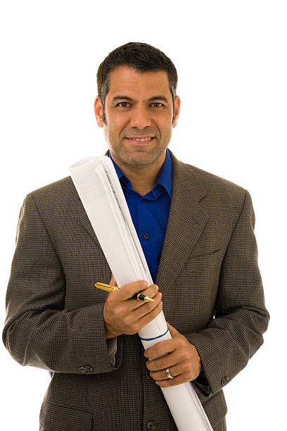 istock Hispanic male wearing a suit holding blueprints 173598462