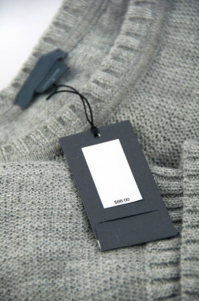 price tag on a cardigan. Selective focus on the tag itself.Related images: