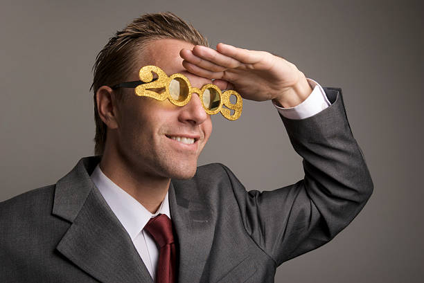 istock Smiling Businessman Looks out to 2009 173598876