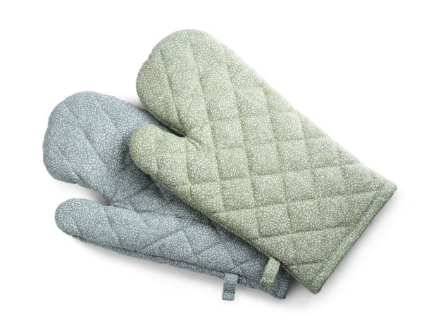 istock Oven gloves for hot dishes isolated on white, top view 1735989504