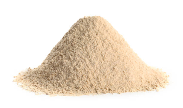 istock Pile of buckwheat flour isolated on white 1735995440
