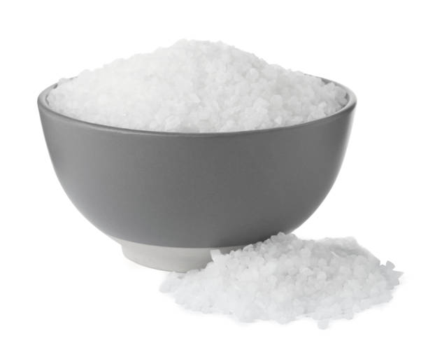 istock Natural sea salt in grey bowl on white background 1735995959