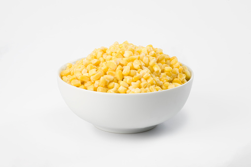 White bowl full of yellow sweet corn