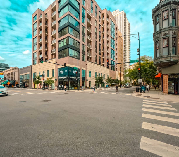 Chicago, Illinois, USA, October 8, 2023, Road Intersection in Downtown, Located along North State Street and East Division Street. Views of retail shops, restaurants, businesses and residential buildings. Mix of new and historical architecture.