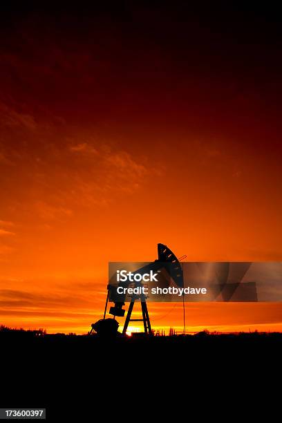 Oil Industry Derrick At Dusk Stock Photo - Download Image Now - Alberta, Back Lit, Black Color