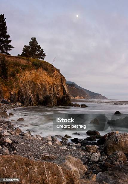 Rocky Coastline And Moon At Dusk Stock Photo - Download Image Now - Big Sur, California, Cliff