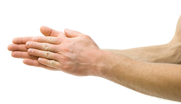 Rubbing Hands Together stock photo