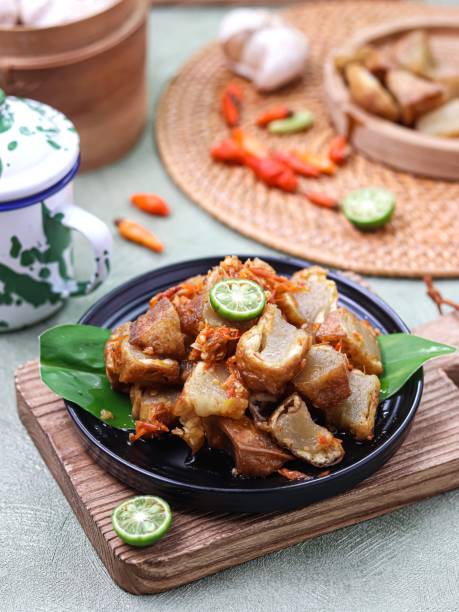istock Tahu Kocek, fried tofu filled with tapioca dough, served with spicy chili sauce 1736019450