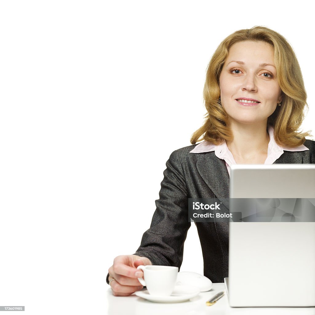 Businesswoman working on laptop 20-24 Years Stock Photo