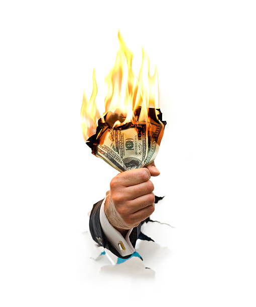 queimar dinheiro - money to burn fotos imagens e fotografias de stock